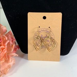 Gold dangle style earrings